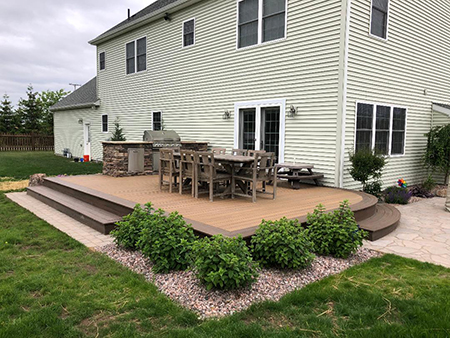 Trex Deck with an Outdoor Kitchen and Paver Patio